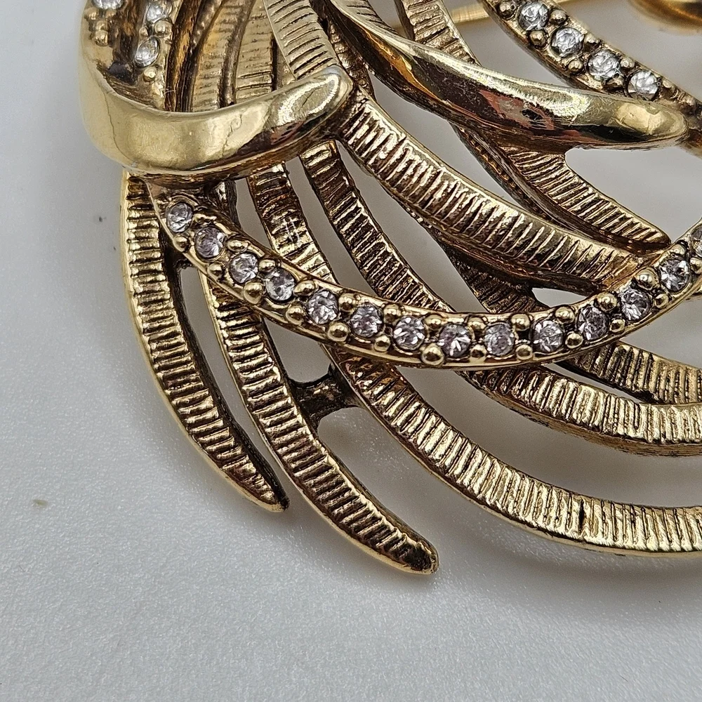 VINTAGE Monet Gold Tone Pave Rhinestone Swirls Sculptural Brooch Pin Signed